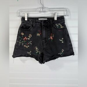 Banjara women’s faded black floral embroidered cutoff denim shorts. Size 00/22